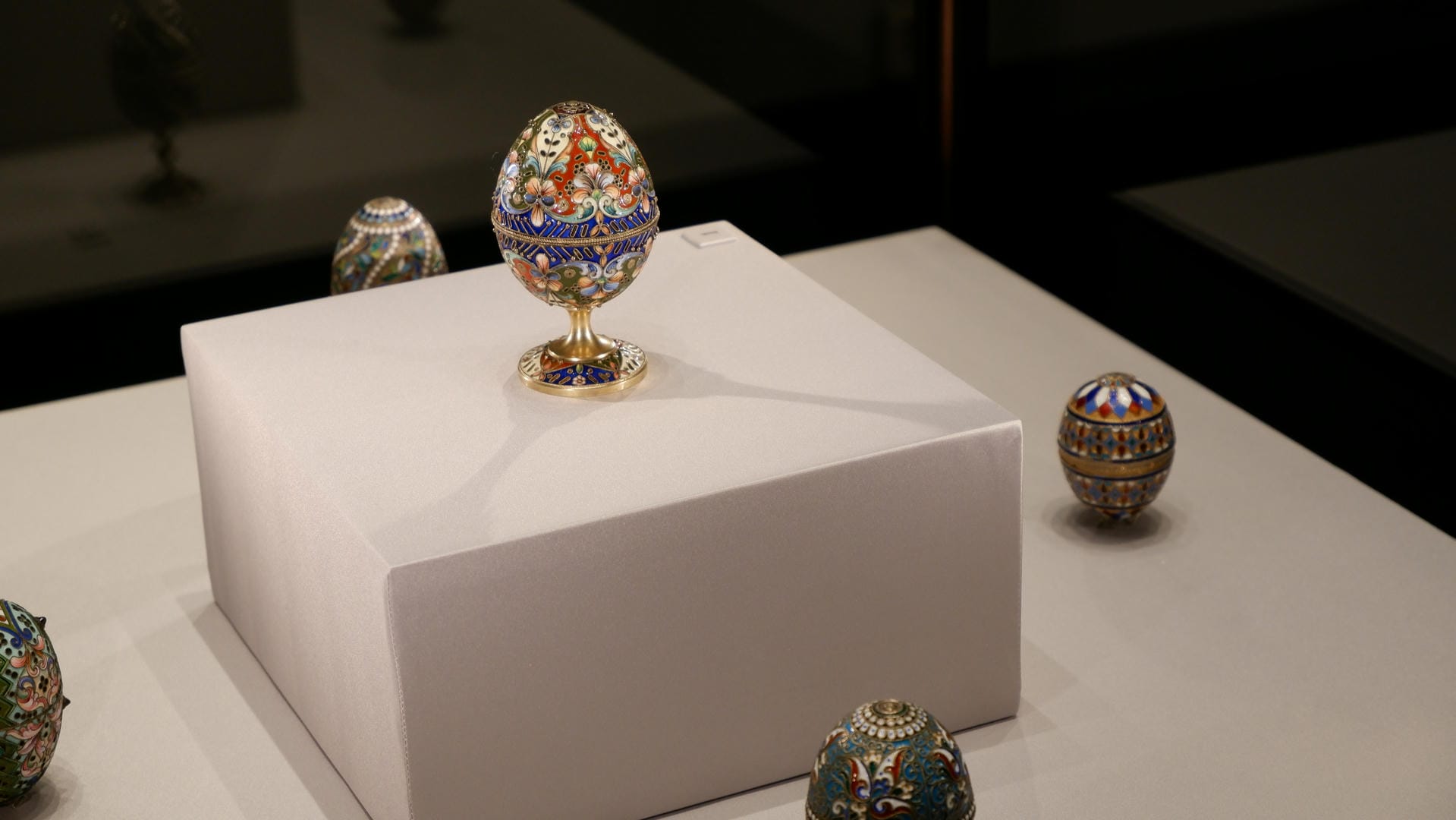 Multiple colorful Fabergé eggs, each with unique patterns.