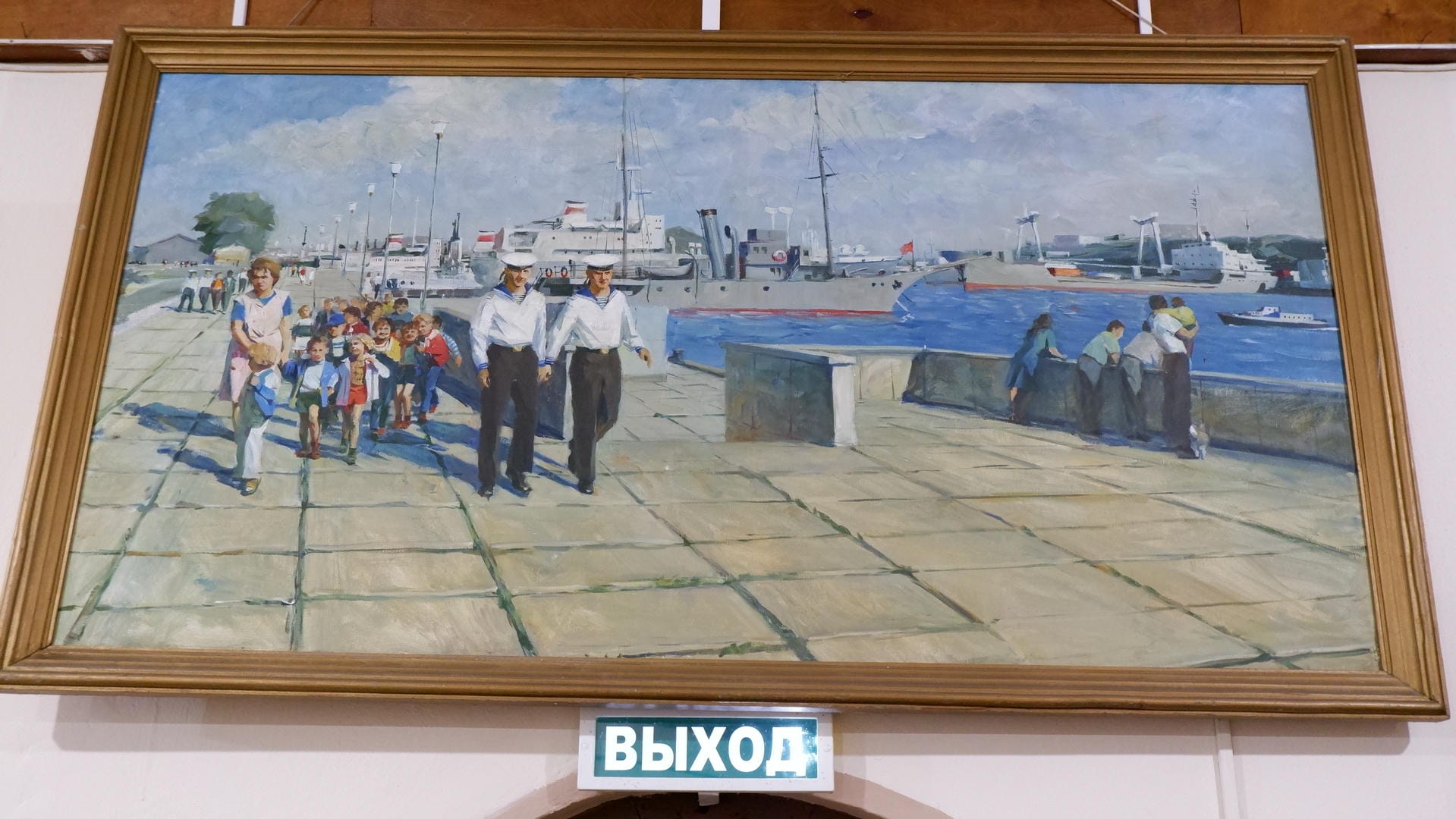 A painting depicting two people leading a group of children walking along a pier.