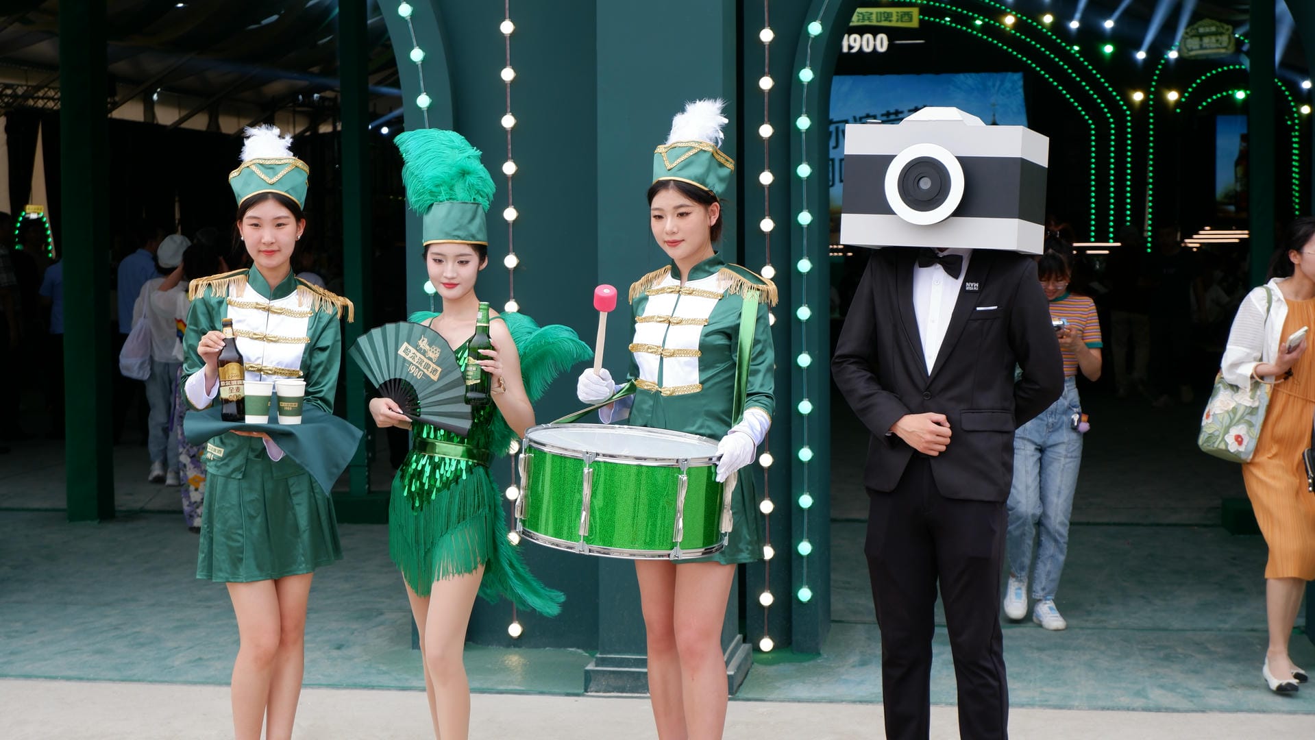 there are three people dressed in costumes and holding drums