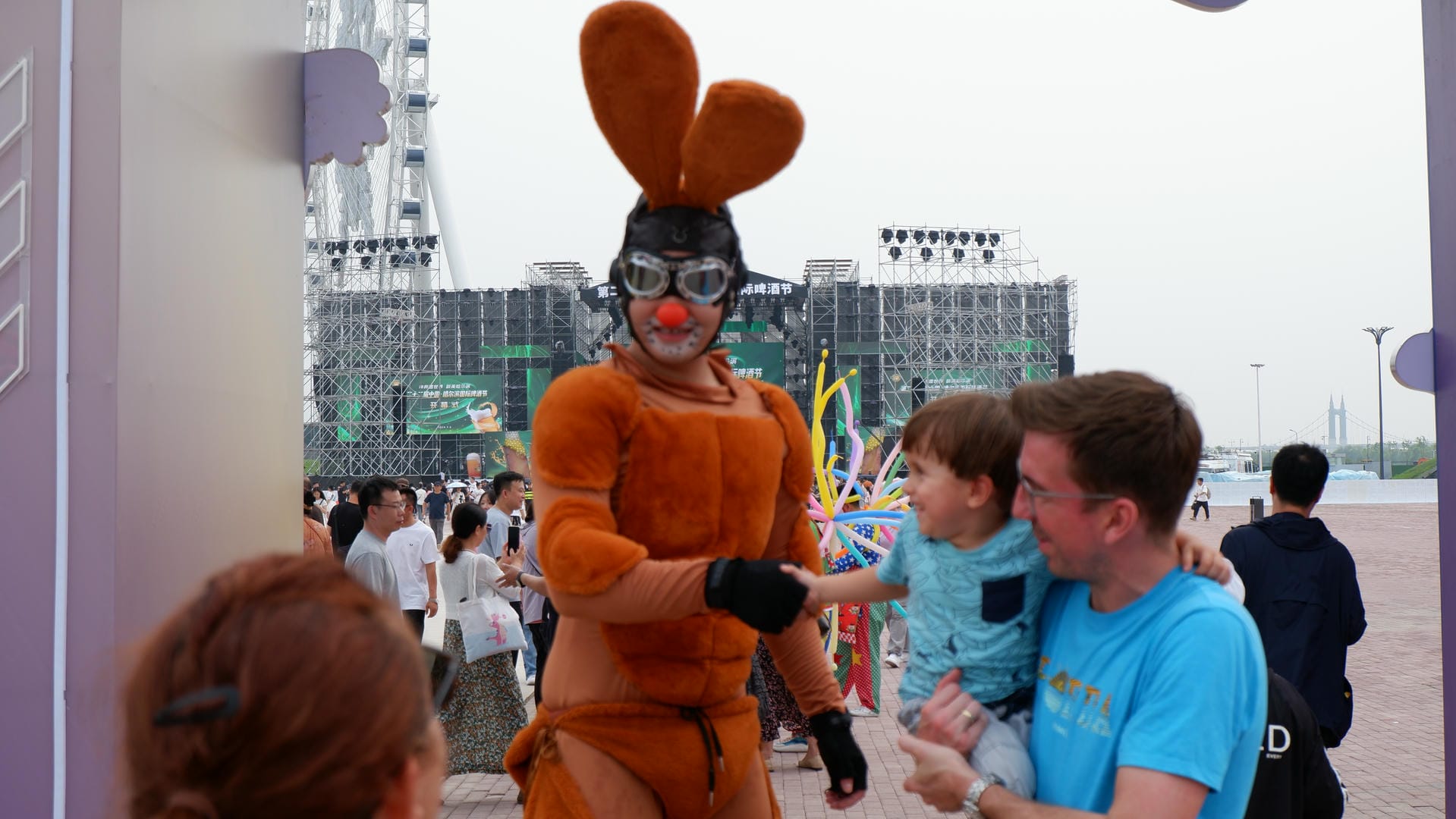 there is a man in a costume and a child in a blue shirt