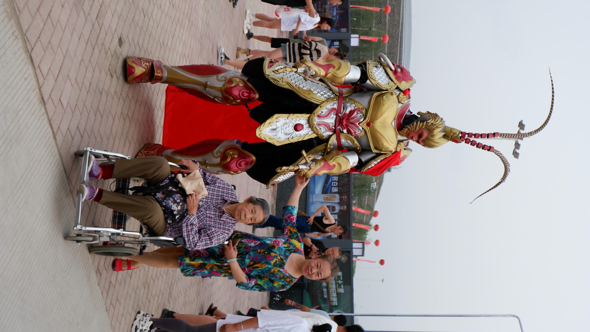 there is a man in a costume that is sitting in a wheel chair