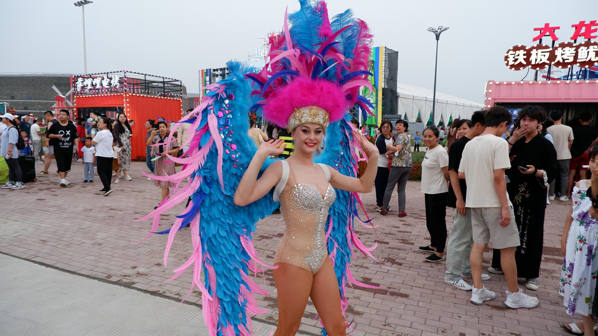 woman dressed in a costume and holding a cell phone