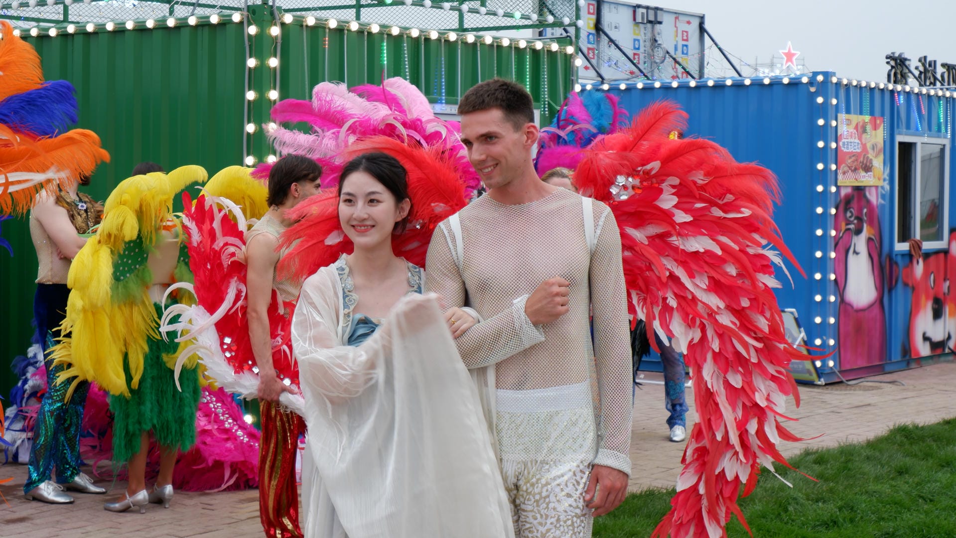 they are dressed in colorful costumes and feathered headdress